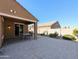 Backyard patio with seating area and access to house at 21209 N 40Th Ave, Glendale, AZ 85308