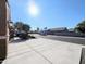 View of a quiet residential street with desert landscaping at 21209 N 40Th Ave, Glendale, AZ 85308