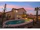 Backyard with a pool, patio, balcony and desert landscaping at 2249 E Taxidea Way, Phoenix, AZ 85048