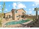 Two-story home featuring a backyard pool, balcony and covered patio at 2249 E Taxidea Way, Phoenix, AZ 85048