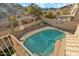 Elevated shot of backyard with a pool and desert landscape at 2249 E Taxidea Way, Phoenix, AZ 85048