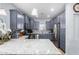 Modern kitchen with gray cabinets, granite countertops, and stainless steel appliances at 26407 N 166Th Ave, Surprise, AZ 85387
