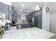 Modern kitchen with gray cabinets, granite countertops, and stainless steel appliances at 26407 N 166Th Ave, Surprise, AZ 85387