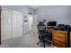 Home office with a desk, chair, and computer at 26407 N 166Th Ave, Surprise, AZ 85387