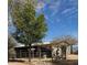 Exterior view of barn with horses visible in stalls at 29305 N 146Th St, Scottsdale, AZ 85262