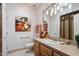Clean bathroom with single vanity and neutral color palette at 29305 N 146Th St, Scottsdale, AZ 85262