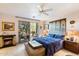 Relaxing bedroom with patio access, large bed, and tranquil decor at 29305 N 146Th St, Scottsdale, AZ 85262
