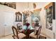 Cozy breakfast nook with a glass-top table and four chairs at 29305 N 146Th St, Scottsdale, AZ 85262
