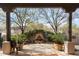Charming courtyard with fountain, landscaping, and horse statues at 29305 N 146Th St, Scottsdale, AZ 85262