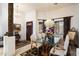Elegant dining room with a chandelier and large windows at 29305 N 146Th St, Scottsdale, AZ 85262
