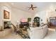 Bright living room with a fireplace and comfortable seating at 29305 N 146Th St, Scottsdale, AZ 85262