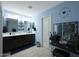 Double vanity bathroom with light blue walls at 3446 N Mayfair St, Mesa, AZ 85213