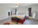 Bright bedroom with ample natural light, featuring neutral decor and laminate floors, offers a relaxing and comfortable atmosphere at 3446 N Mayfair St, Mesa, AZ 85213