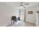 Clean bedroom featuring a ceiling fan, light-colored walls, and a small desk with a printer at 3446 N Mayfair St, Mesa, AZ 85213