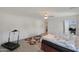 Bright bedroom with ample natural light and wood-look floors, offering a peaceful retreat for rest and relaxation at 3446 N Mayfair St, Mesa, AZ 85213