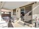 Covered patio features comfortable seating and access to the pool at 3446 N Mayfair St, Mesa, AZ 85213
