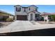 Charming two-story home with a desert-landscaped front yard and a spacious two-car garage at 3446 N Mayfair St, Mesa, AZ 85213