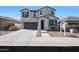 Beautiful two-story home with a well-manicured front yard and a convenient two-car garage at 3446 N Mayfair St, Mesa, AZ 85213