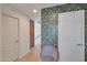 Hallway with decorative wallpaper, hardwood floors, recessed lighting, and stairway access at 3446 N Mayfair St, Mesa, AZ 85213