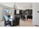 Modern kitchen and dining area with stylish countertops and backyard pool view at 3446 N Mayfair St, Mesa, AZ 85213