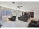 Open-concept living and dining area with a large window and stylish tile flooring at 3446 N Mayfair St, Mesa, AZ 85213