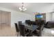 Open floor plan showcasing the dining area and living room with fireplace at 3446 N Mayfair St, Mesa, AZ 85213