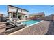 Inviting pool area with lounge chairs and a spacious patio at 3446 N Mayfair St, Mesa, AZ 85213