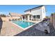 Inviting pool area with lounge chairs and a spacious patio at 3446 N Mayfair St, Mesa, AZ 85213