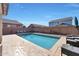Inviting pool area with lounge chairs and a spacious patio at 3446 N Mayfair St, Mesa, AZ 85213