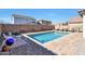 Inviting pool area with lounge chairs and a spacious patio at 3446 N Mayfair St, Mesa, AZ 85213