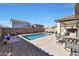 Inviting backyard oasis with a rectangular pool and patio furniture at 3446 N Mayfair St, Mesa, AZ 85213