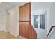 Bright staircase with wooden slat wall and window, providing natural light and modern design at 3446 N Mayfair St, Mesa, AZ 85213