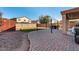 Spacious backyard with patio, pergola, and storage shed at 35834 W Cartegna Ln, Maricopa, AZ 85138