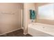 Bathroom features a shower and bathtub at 35834 W Cartegna Ln, Maricopa, AZ 85138