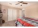 Bedroom with a double bed and sliding door closet at 35834 W Cartegna Ln, Maricopa, AZ 85138