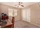 Bright bedroom with carpet flooring and built-in closet at 35834 W Cartegna Ln, Maricopa, AZ 85138
