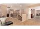 Upstairs hallway with tile flooring and access to bedrooms at 35834 W Cartegna Ln, Maricopa, AZ 85138