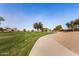 Curving path through grassy park area at 35834 W Cartegna Ln, Maricopa, AZ 85138
