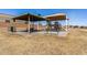 Community park with playground and picnic tables at 35834 W Cartegna Ln, Maricopa, AZ 85138