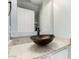 Stylish powder room with granite countertop and vessel sink at 415 W Midland Ln, Gilbert, AZ 85233