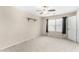 Bedroom featuring carpet, a ceiling fan, and neutral walls at 415 W Midland Ln, Gilbert, AZ 85233