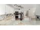 Modern kitchen featuring granite countertops, stainless steel appliances, and stylish backsplash at 415 W Midland Ln, Gilbert, AZ 85233