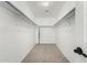 Empty walk-in closet featuring carpet flooring and a clothing rod at 415 W Midland Ln, Gilbert, AZ 85233