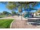 Community playground with swings and climbing structures, perfect for active  at 4362 S Wildflower Pl, Chandler, AZ 85248