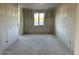 Bedroom showcasing bare walls and a large window for natural light, awaiting personalization at 5510 W Paseo Way, Laveen, AZ 85339