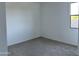 A well lit bedroom featuring neutral carpet and a view from the window at 5510 W Paseo Way, Laveen, AZ 85339