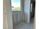 Cozy bedroom corner with bare walls, and a window offering tranquil views of the outdoors at 5510 W Paseo Way, Laveen, AZ 85339