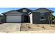 Charming single-Gathering home with a two-car garage and minimal landscaping at 5510 W Paseo Way, Laveen, AZ 85339