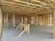 Spacious interior with exposed framing, visible utilities, and an open layout, ideal for customization at 5510 W Paseo Way, Laveen, AZ 85339