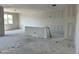 Living room with white drywall, concrete floors and large window at 5510 W Paseo Way, Laveen, AZ 85339